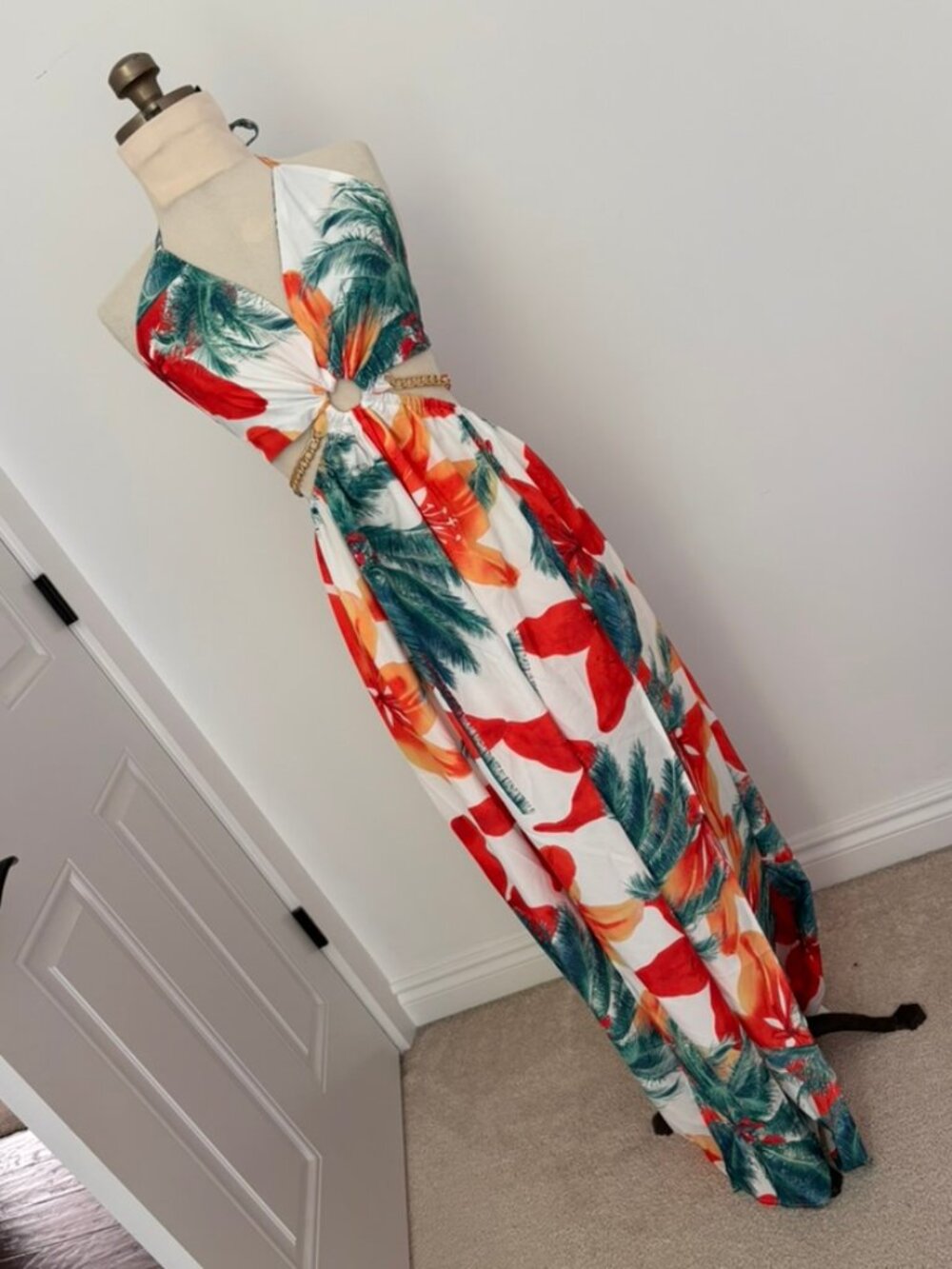Tropical floral print cutout maxi dress, halter neckline and gold chain detail